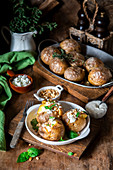 Potatoes baked with cottage cheese and pine nuts