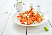 Simple summer salad with watermelon, feta and fresh herbs