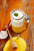 Hot mango milk with fresh orange juice and honey (Christmas)