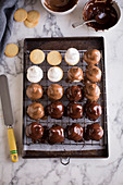 Sweetie pies with marshmallow cream and two types of chocolate glaze