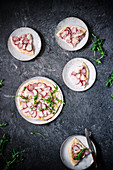 Radish tarte flambée on plates