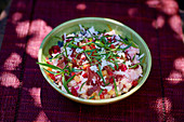 Rice salad with beetroot, pineapple and pepper