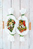 Roasted vegetable parcels with feta cheese and fresh herbs