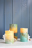 Candle lanterns with covers made from transparent mapss
