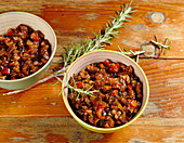 Mediterranean vegetable salad with rosemary in small bowls