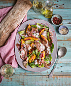 Parma ham salad with cos lettuce and grilled peaches