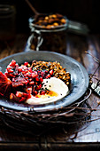 Granola with pomegranate seeds and yoghurt
