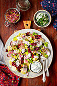 Potato, beetroot and herring salad with yogurt and dill dressing