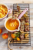 Grilled satay skewers with venison, an apricot dip from New Zealand and mashed potato and sweet potatoes