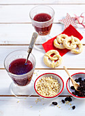 Swedish punch with red wine, brandy, almonds and sultanas served with biscuits