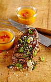 Grilled beef steak with a spicy apricot sauce