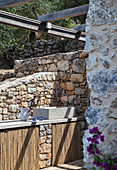 Sink in outdoor kitchen of Italian stone house