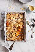 Apricot and almond crumble with custard