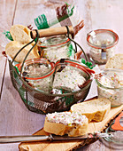 Homemade quark and ham spread with white bread in jars to take away