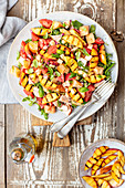 Panzanella with smoked chicken, tomatoes, arugula and grilled nectarines