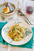 Ricotta and spinach ravioli with Parmesan cheese
