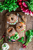Bagels with radish and cucumber and cream cheese