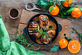Pork chops with tangerines