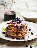 Pancakes with sauce and blueberries