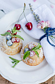 Lemon tartlets with vanilla cream and berries