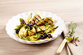 Grilled zucchini and fennel antipasti with olives and fresh herbs