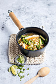 Chicken and asparagus soup with soba noodles