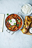 Aubergine curry with lamb cutlets