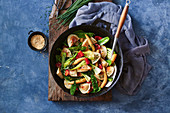 Pork dumpling and Asian greens stir-fry