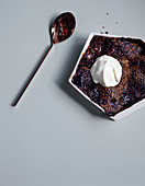 Chocolate self saucing pudding with sesame crunch