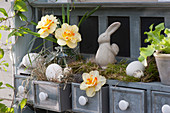 Small Easter decoration in the wall cupboard on the terrace