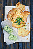 Music paper bread with herb butter