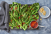 Roasted greens with soy and sambal oelek drizzle