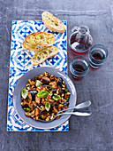 Caponata with pine nuts and toasted bread (Italy)
