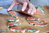 Preparing salmon with cucumber and sriracha mayonnaise