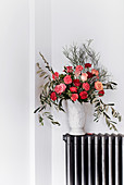 Bouquet of roses, carnation and olive branches
