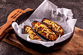 Arabic stuffed eggplants with red lentils, chicken meat, tomato, onion and cheese