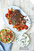 Pull-apart Greek lamb with no-cook chickpea salad and tzatziki