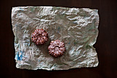 Chocolate biscuits on crumpled paper