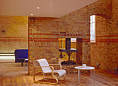 Living room in old building with brick walls