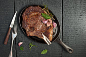 Ribeye steak in cast iron pan