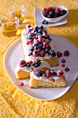 Light corn cake with condensed milk and forest berries