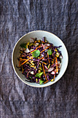 Red cabbage salad with honey and pistachio nuts