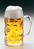 Light full beer in a mug (lager)