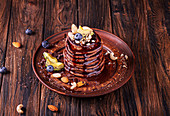 Vegan avocado pancakes with cocoa and date syrup