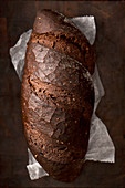 Dark pumpernickel rye bread loaf