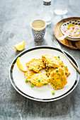 Fried zucchini fritters with peas