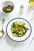 Green zucchini salad with black lentils and fresh mint