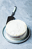 A white cake with cream