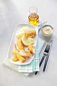 Fish fingers with mashed potatoes and mustard sauce