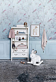 White shelves and a rocking hare in a nursery
